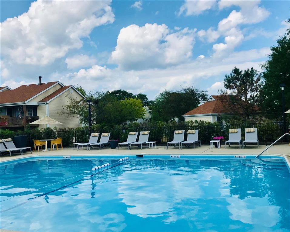 Lounge chairs by pool at The Winds at Poplar Creek, Schaumburg, Illinois