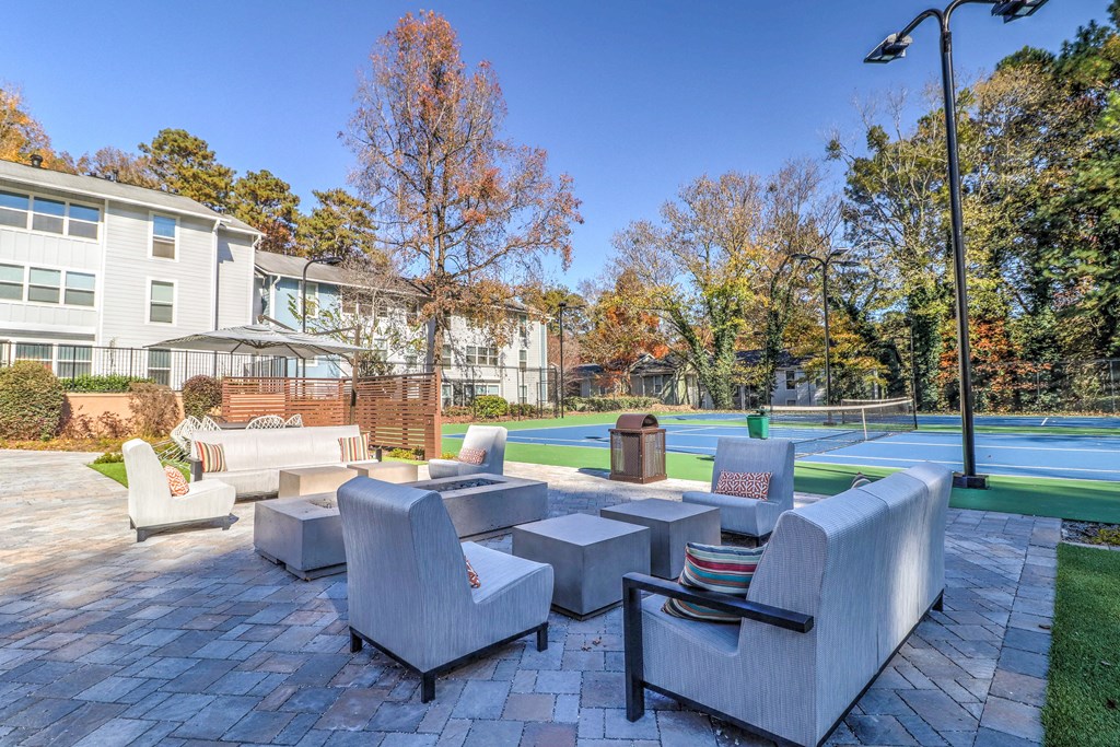 Seating by tennis court at Rosemont Vinings Ridge Apartments, Atlanta, GA