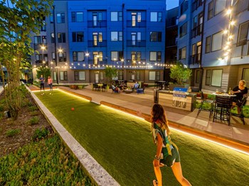 Outdoor pickle ball court with seating and lighting - Photo Gallery 10