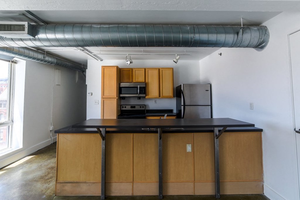 Fully Equipped Kitchen Fully Equipped Kitchen at Janus Lofts, Managed by Buckingham Urban Living, Indianapolis, IN