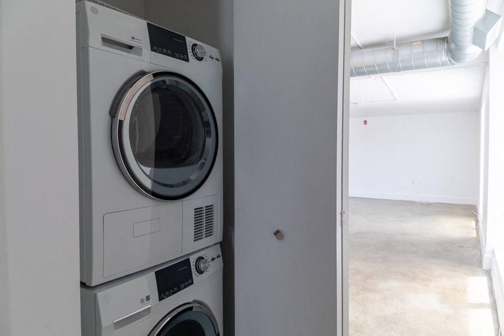 In Home Stacked Washer/Dryer In Home Stacked Washer/Dryer at Janus Lofts, Managed by Buckingham Urban Living, Indianapolis, IN, 46225