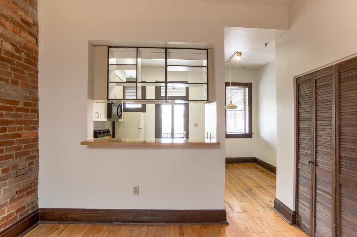 Living Area and Kitchen view at Lockerbie Court on Mass Ave, Indianapolis, IN