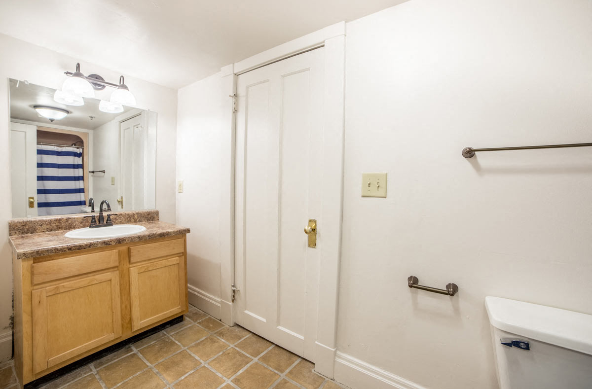Bathroom with Cupboard under basin at Lockerbie Court on Mass Ave, Indianapolis, IN