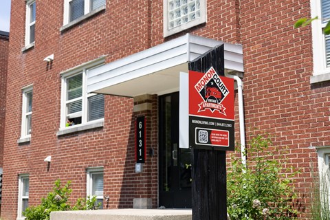 Monon Court Apartments building entrance in Broad Ripple offering affordable one- and two-bedroom apartments close to Monon Trail.