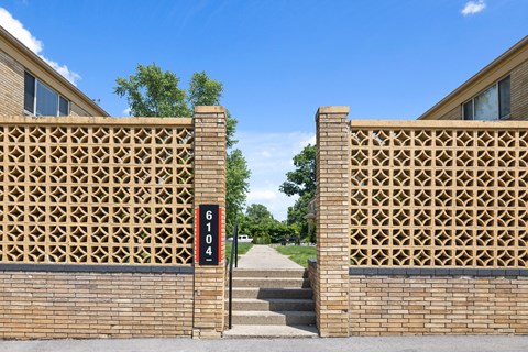 Entrance at Monon Court Apartments Broad Ripple, IN with vintage apartment living steps from the Monon Trail and 61st Street.