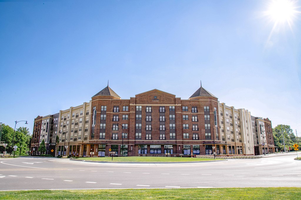 a large building with a street in front of it