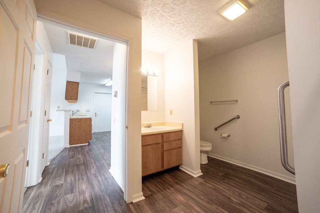 a bathroom with a toilet and a sink