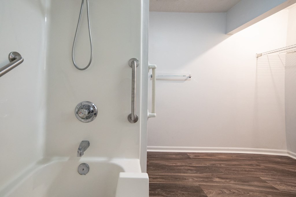 a bathroom with a shower and a toilet