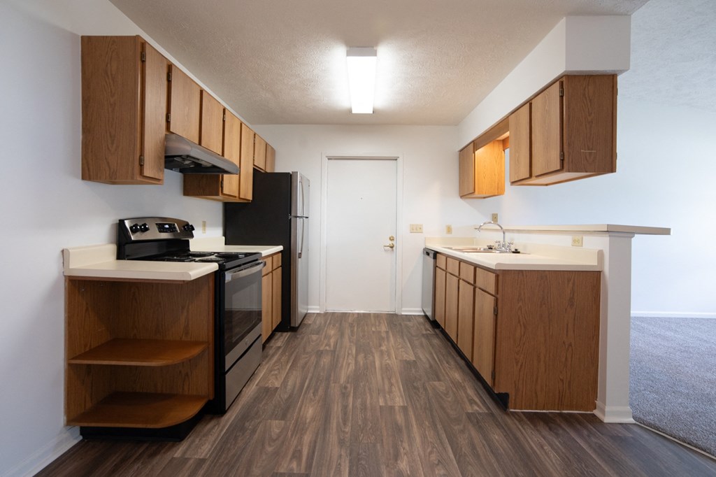 a kitchen area in a 555 waverly unit