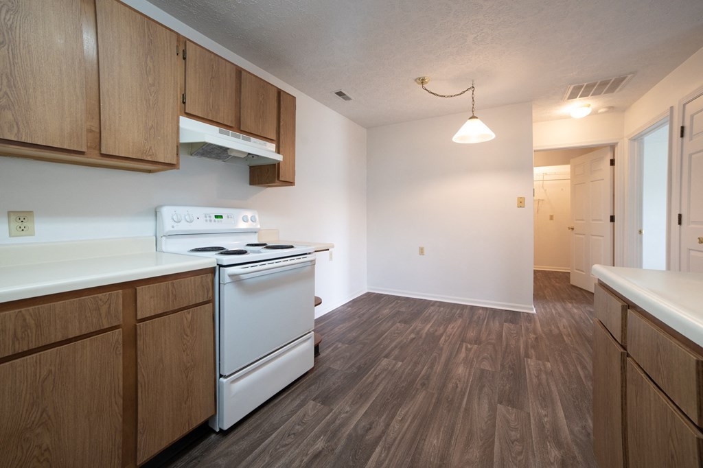 a kitchen and dining area in a 555 waverly unit