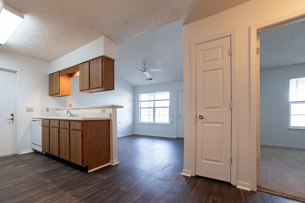an open kitchen and living room in a house