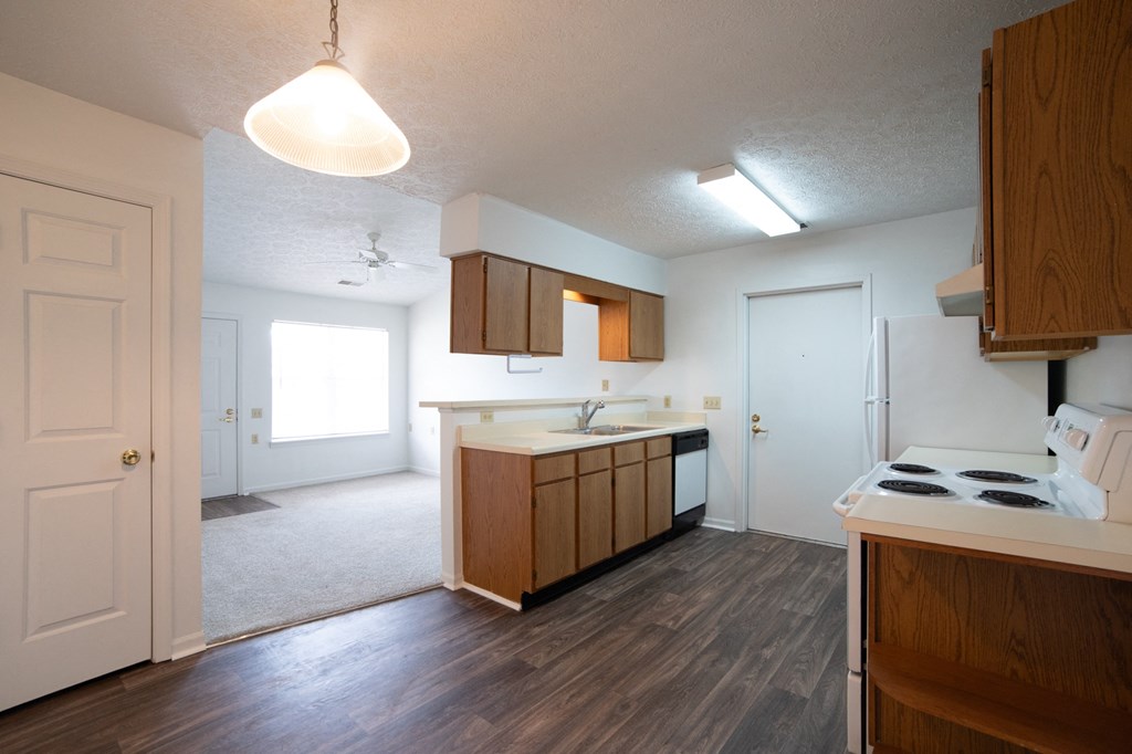 a kitchen and living room in a 555 waverly unit
