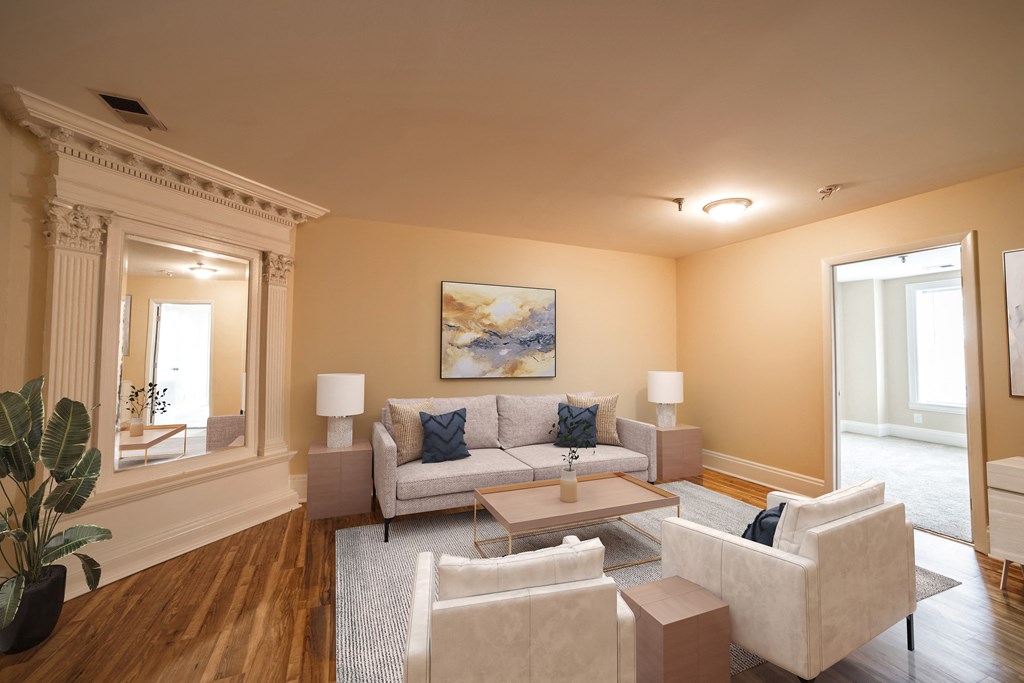 Staged living room at The Plaza at Library Square Apartments, 902 N. Pennsylvania Street, Indianapolis