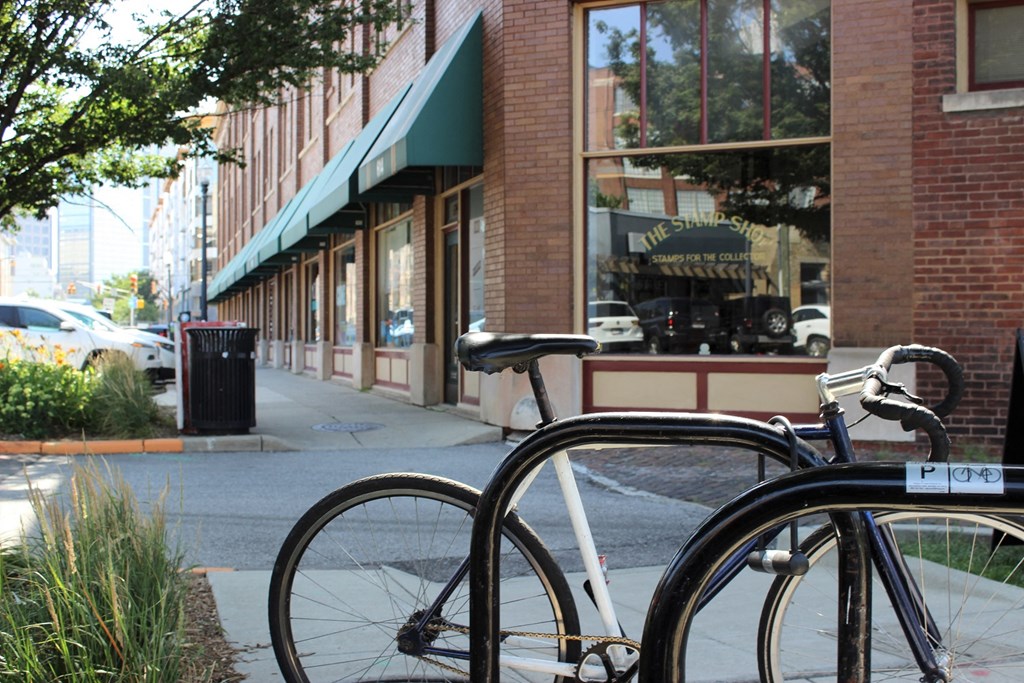 Cycle standing in front of the apartment at The Argyle on Mass Ave, Indianapolis, Indiana