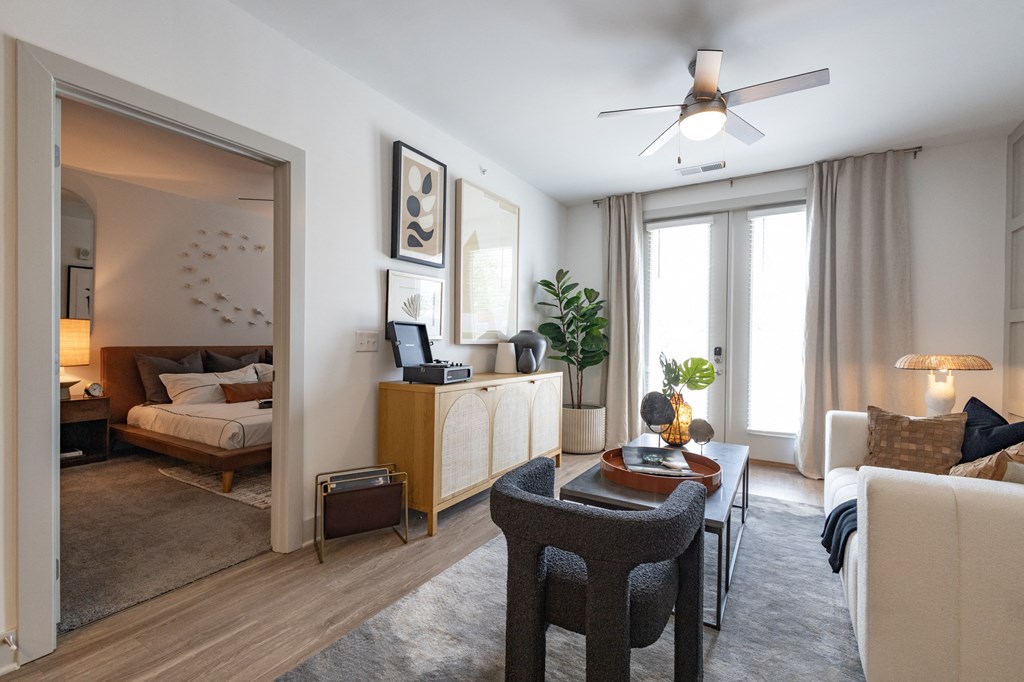 a living room and bedroom in a 555 waverly unit