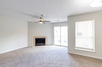 Carpeted Living Area at The Residence at White River Apartments, Indianapolis, IN - Photo Gallery 25