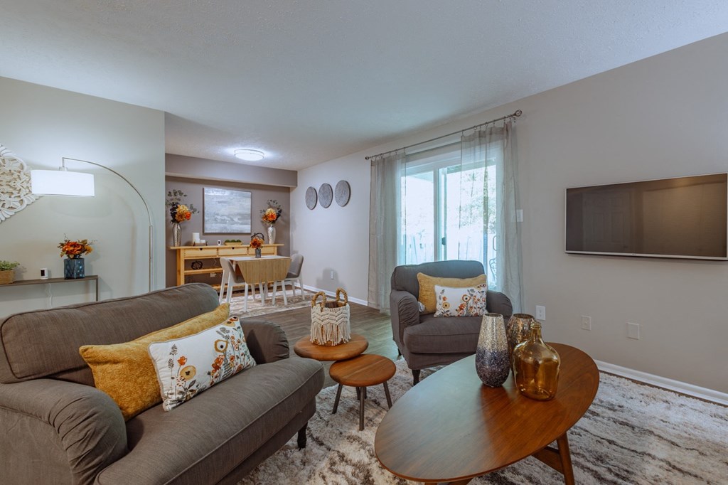 a living room with couches and a coffee table