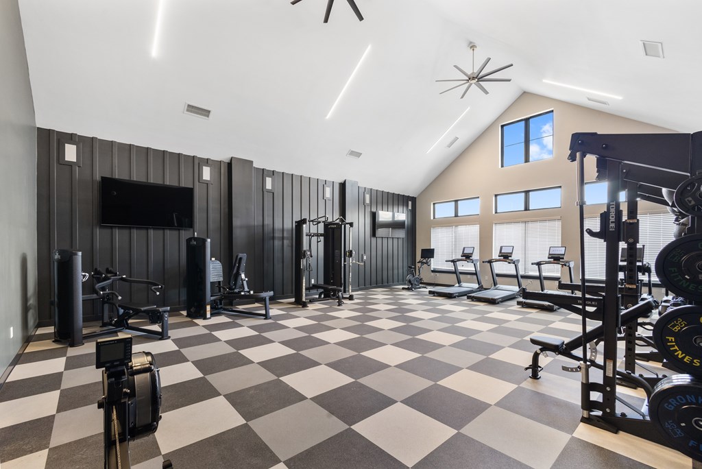 State-of-the-art fitness center at Nook Nine with strength training, cardio machines, and modern gym equipment.