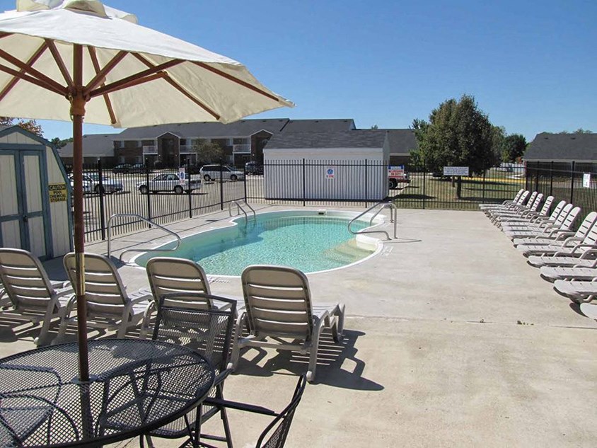 Poolside Sundeck With Relaxing Chairs at Bradford Place Apartments, Lafayette, IN