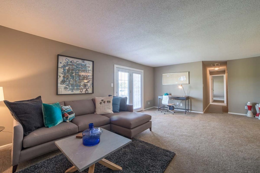 a living room with a couch and a coffee table