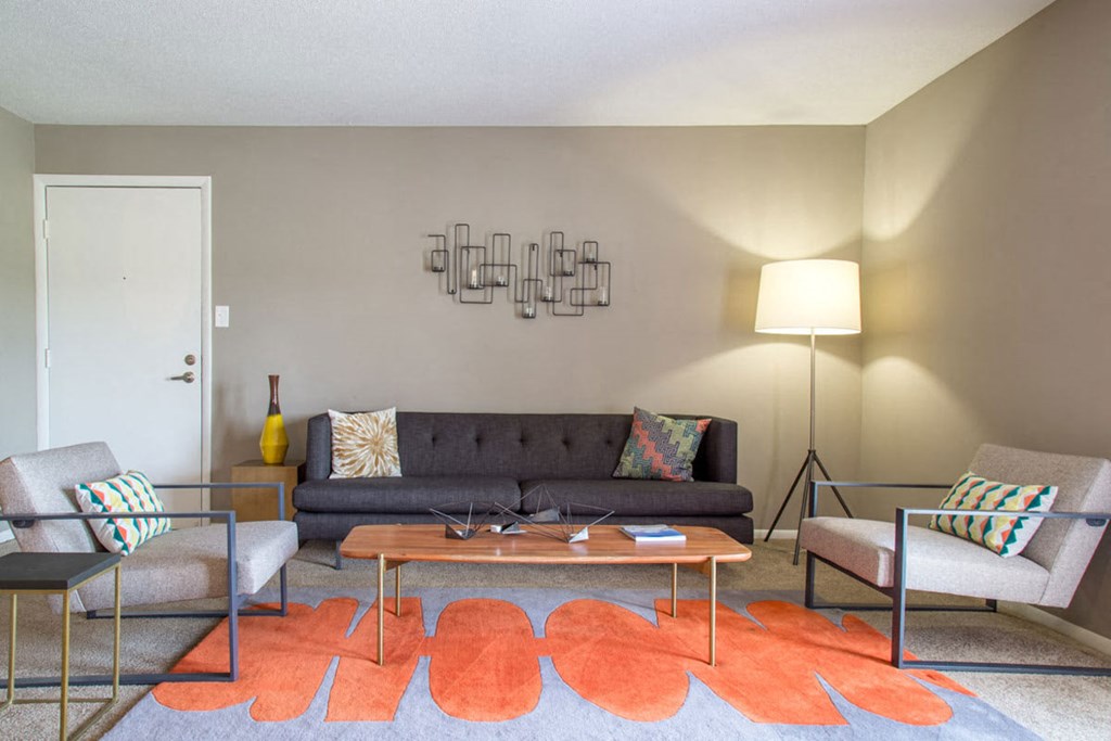 a living room with a couch and a coffee table