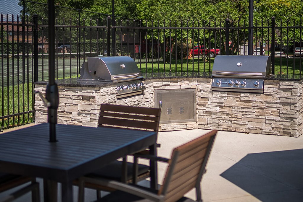 Outdoor Grill With Intimate Seating Area at Woodbridge Apartments, Louisville, Kentucky