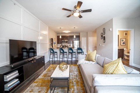 a living room with a couch and a coffee table at The Century at Purdue Research Park-Student, Indiana