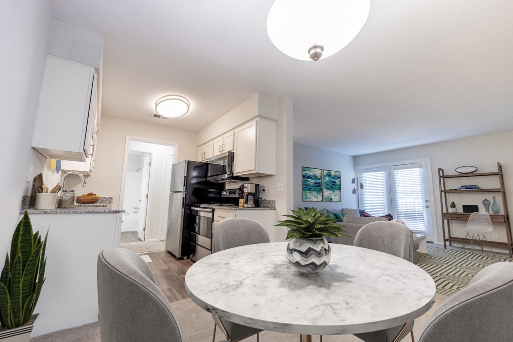 Dining Area With Kitchen View at Gramercy, Carmel, Indiana