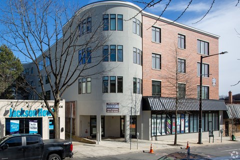 a building on the corner of a city street