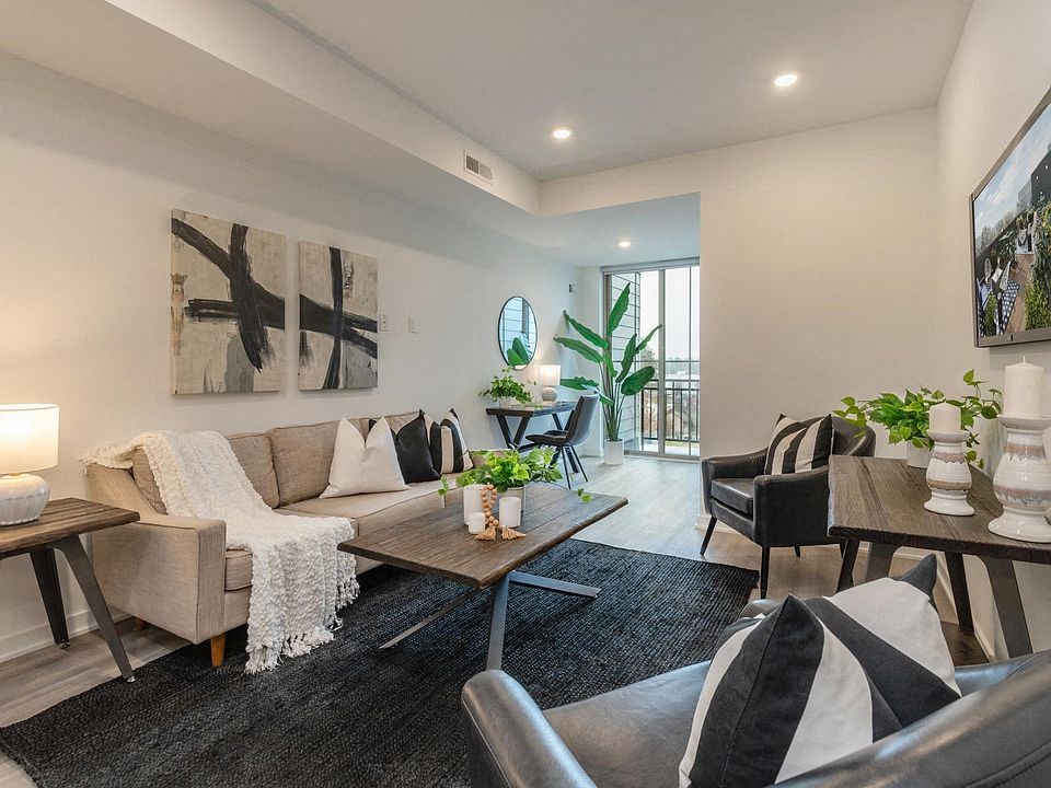 a living room with a couch and a table