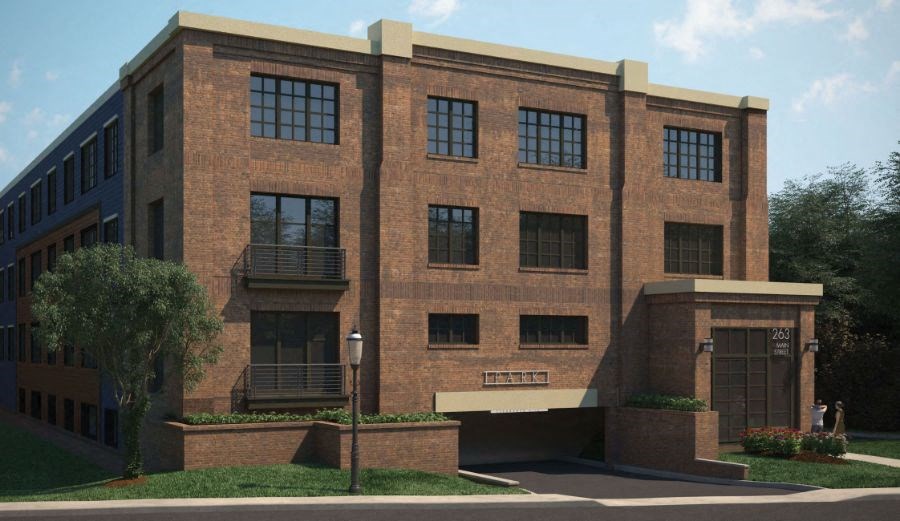 a large brick building on the side of a street