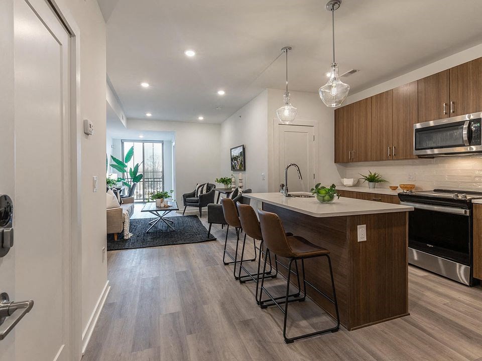 a kitchen and living room in a house