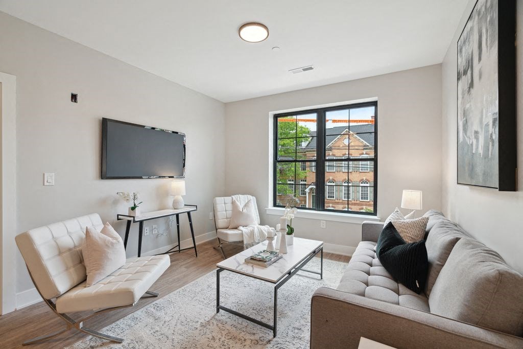 a living room with a couch and a television