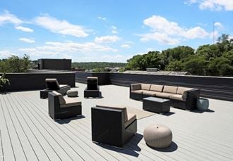 a lounge area on the roof of a building