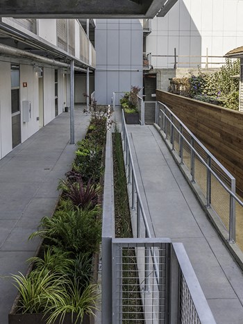 Walkway by buildings l 4801 Shattuck Apts - Photo Gallery 3