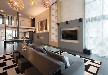 Clubhouse seating by fireplace and pool table - Photo Gallery 4
