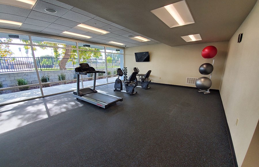 Fitness room with gym equipment 