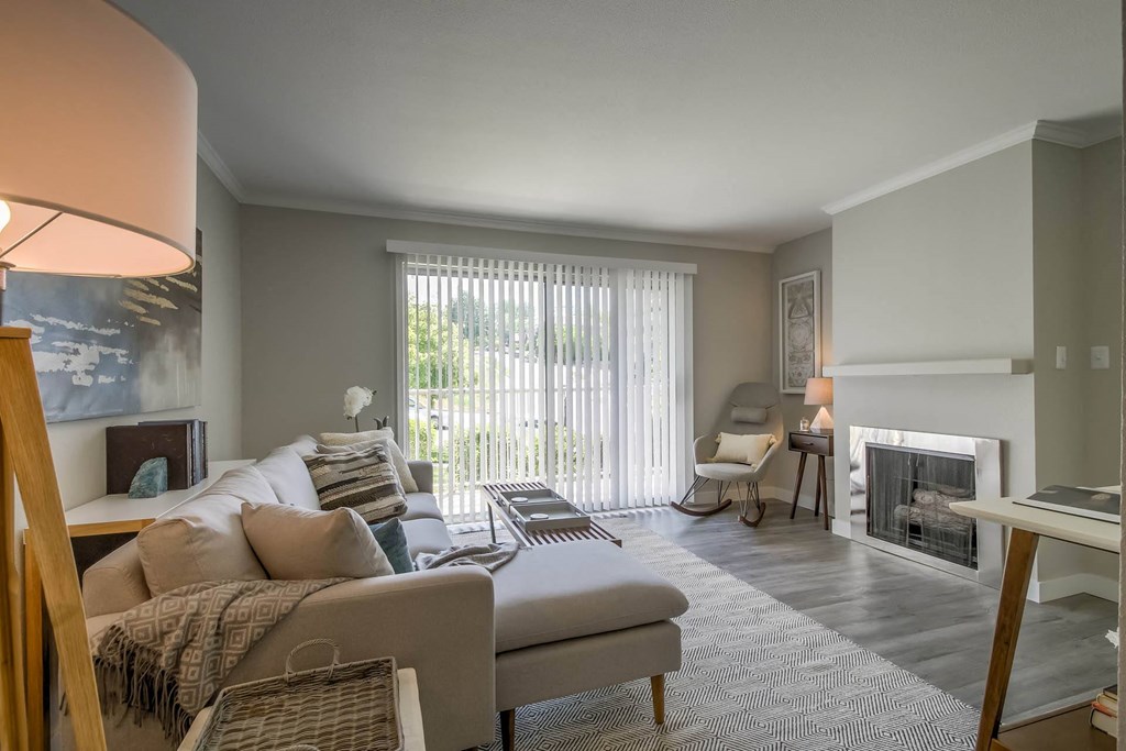 a living room with a couch and a fireplace at Park Capitol, Salt Lake City Utah