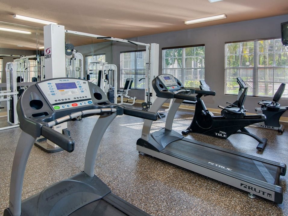 Gym with cardio  equipment at Banyan Pointe, Coconut Creek