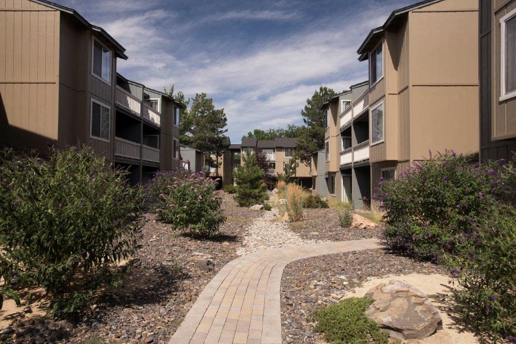 Exterior view of building with sidewalk