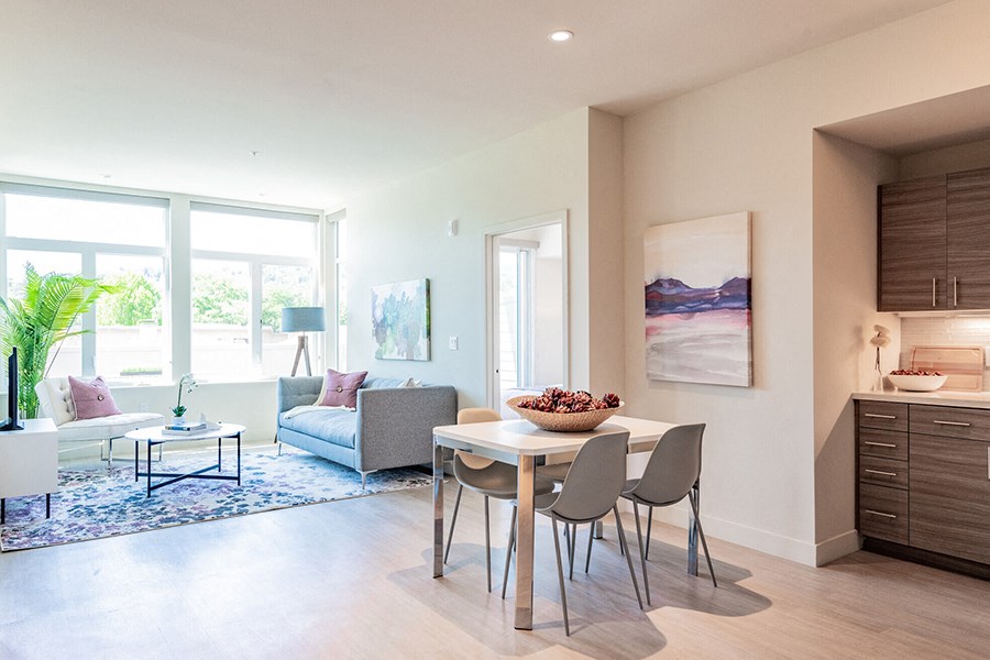 living room with over-sized windows and lots of natural lighting
