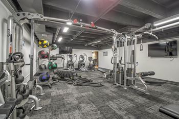 the gym at the flats at big tex apartments at Park Capitol, Utah, 84103