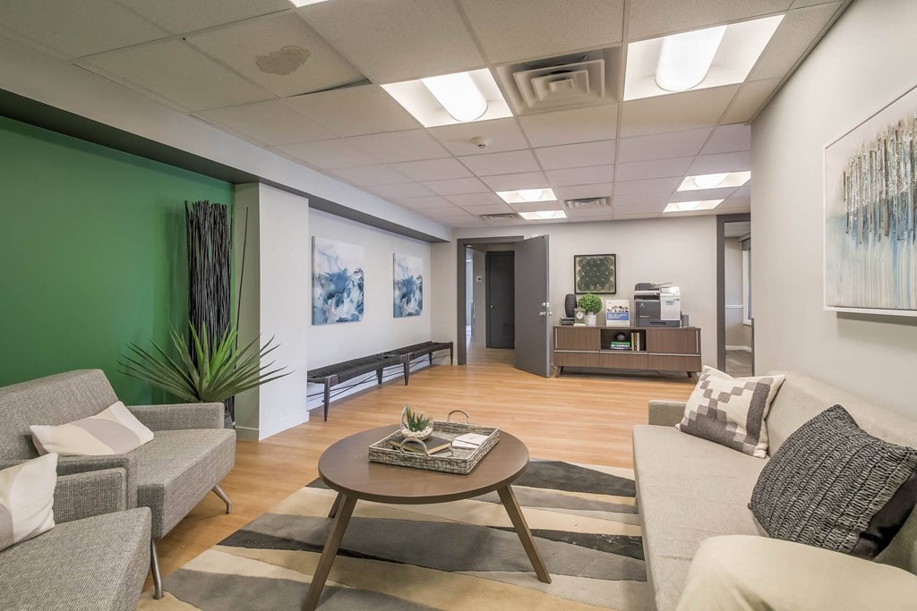 a living room with couches and a coffee table at Park Capitol, Salt Lake City Utah
