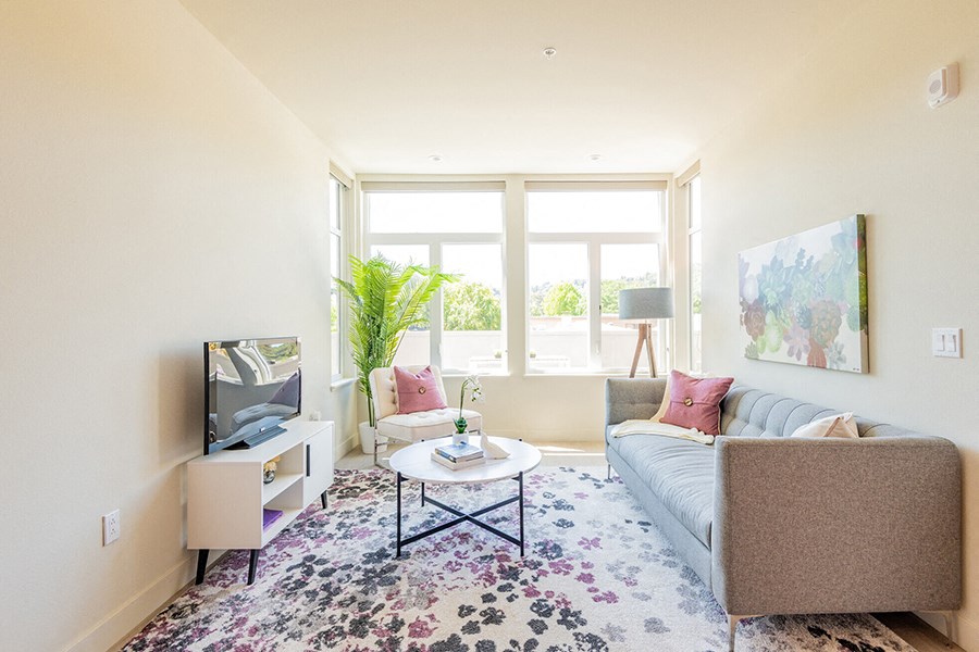 Living room with over-sized windows and lots of natural lighting