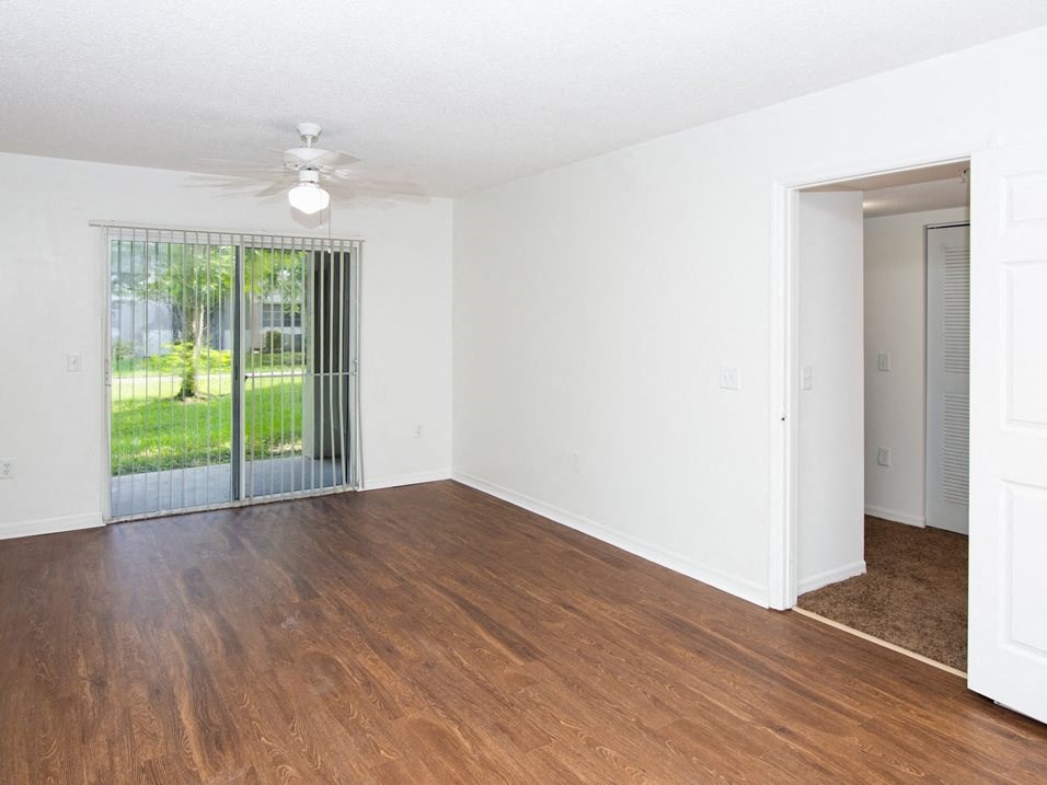 Living room with patio at Banyan Pointe, Coconut Creek