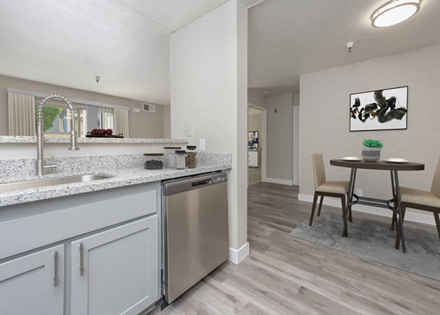 Kitchen area with view of dining