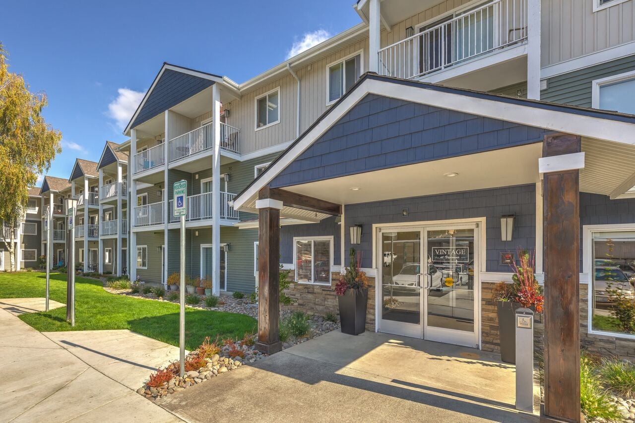 Exterior view of building with landscape at VINTAGE AT VANCOUVER, Vancouver, WA