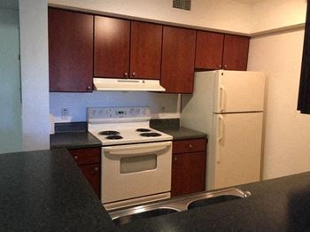  kitchen with appliances at Alhambra Cove, Miami