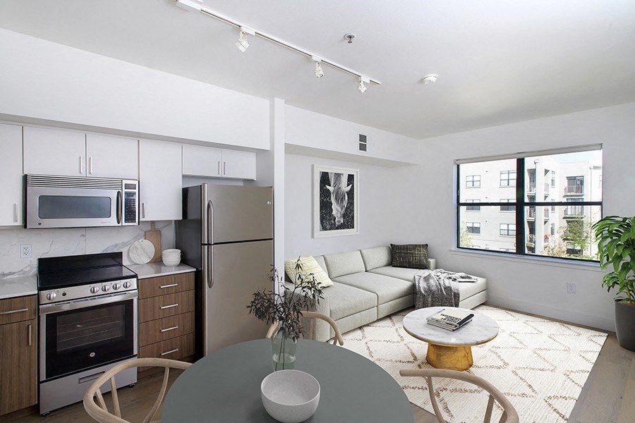 Midtown Sacramento Apartments for Rent - 1801L - Open Concept Floor Plan with Modern Kitchen, Dining Area, and Living Room with Wood Style Flooring