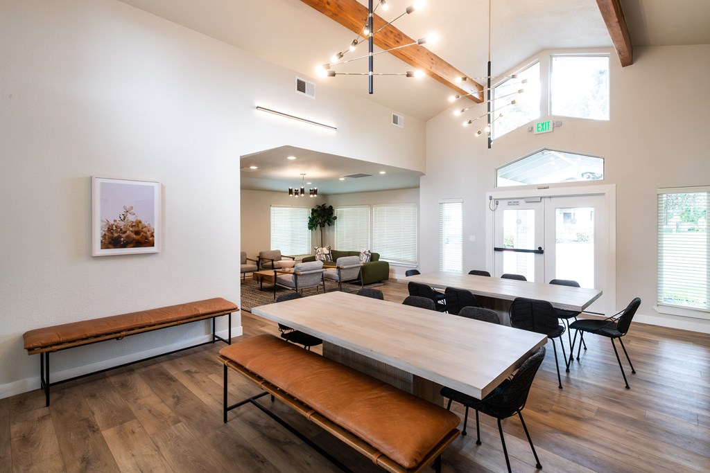 a room with a table and chairs